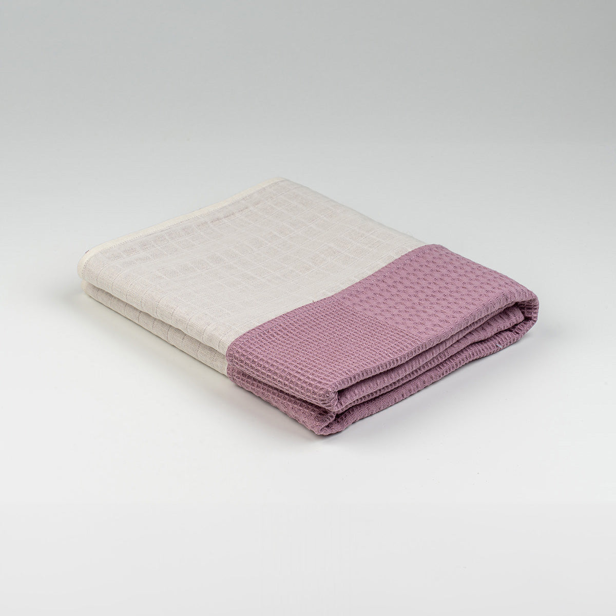 Katlanmış violet sade desenli waffle örtü