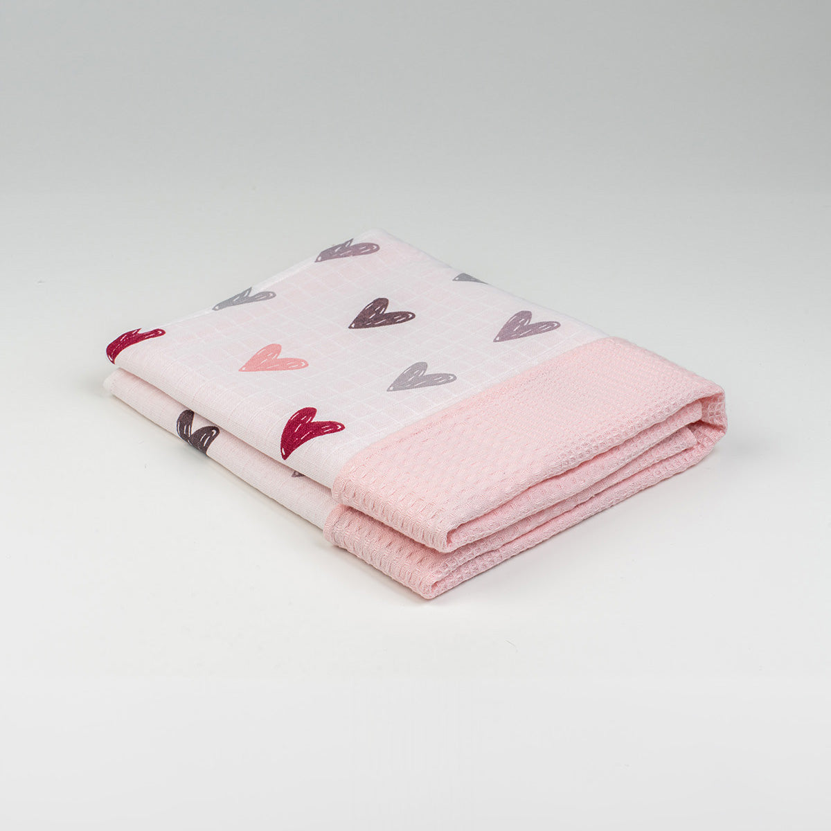 Katlanmış pembe kalp desenli waffle örtü